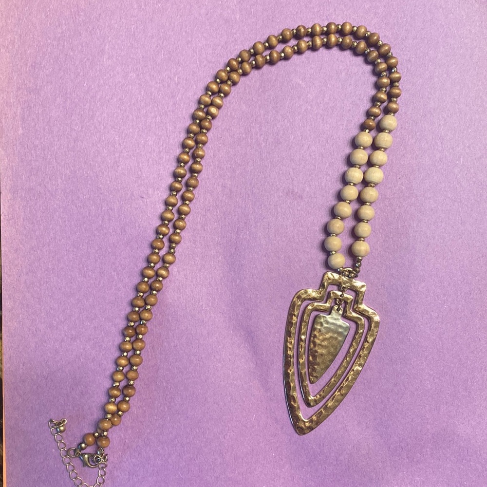 Long arrowhead necklace with natural beads and gold accents